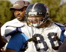Apart from wrestling, he also played football as a defensive tackle and guard in his high school and college team.